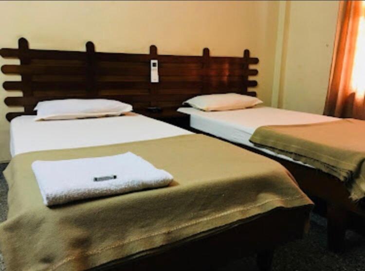 Nellimoottil Guest House Kottayam Quarto foto